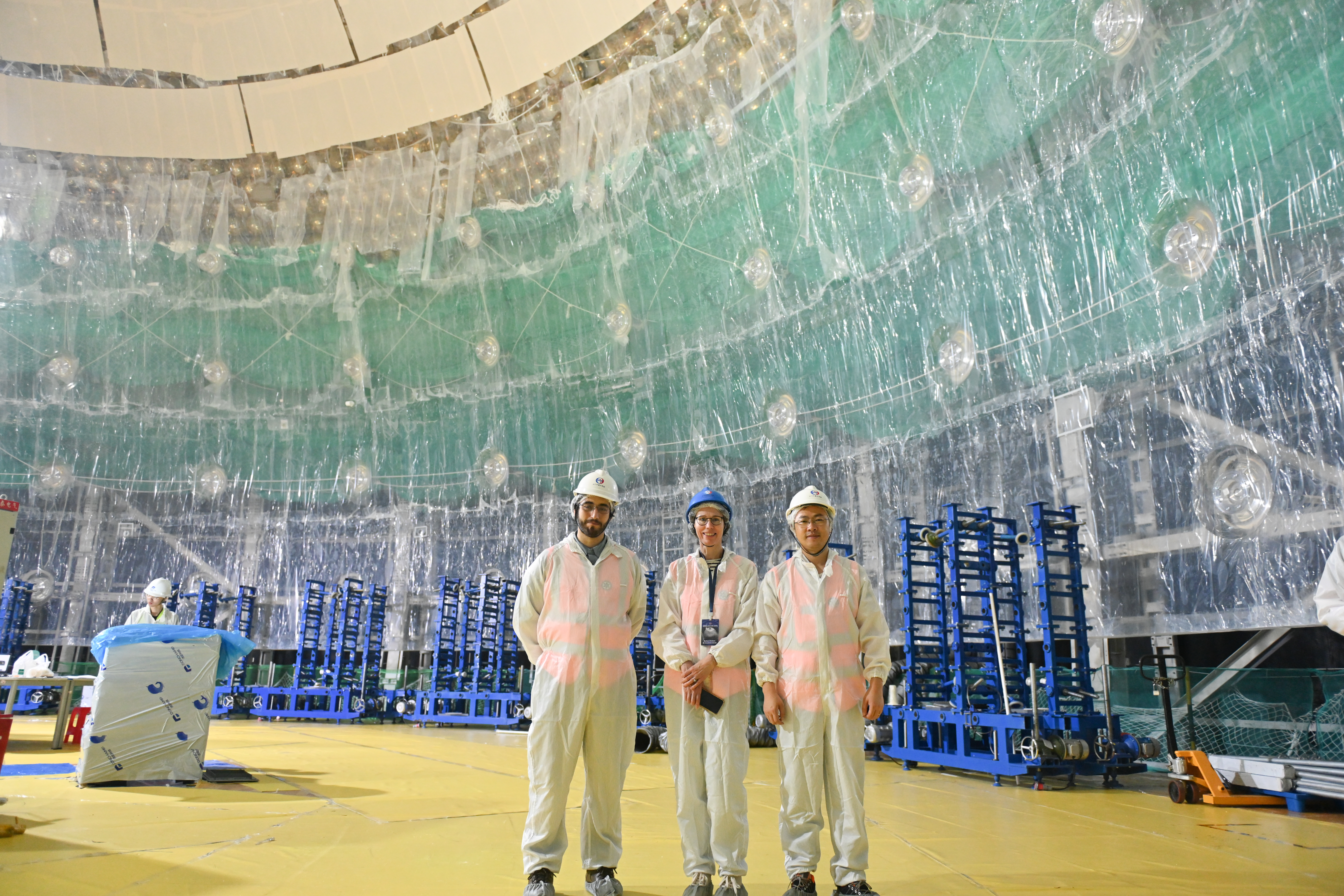JUNO construction milestone : after the stainless steel structure, half of the acrylic sphere is built